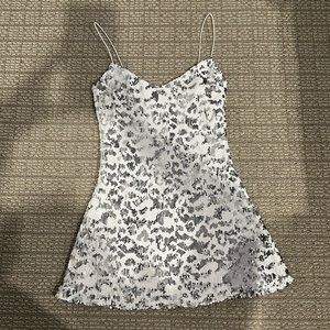 White and sliver mini dress